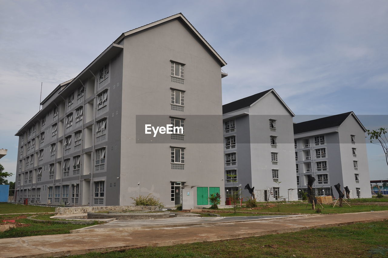 Low angle view of buildings against sky