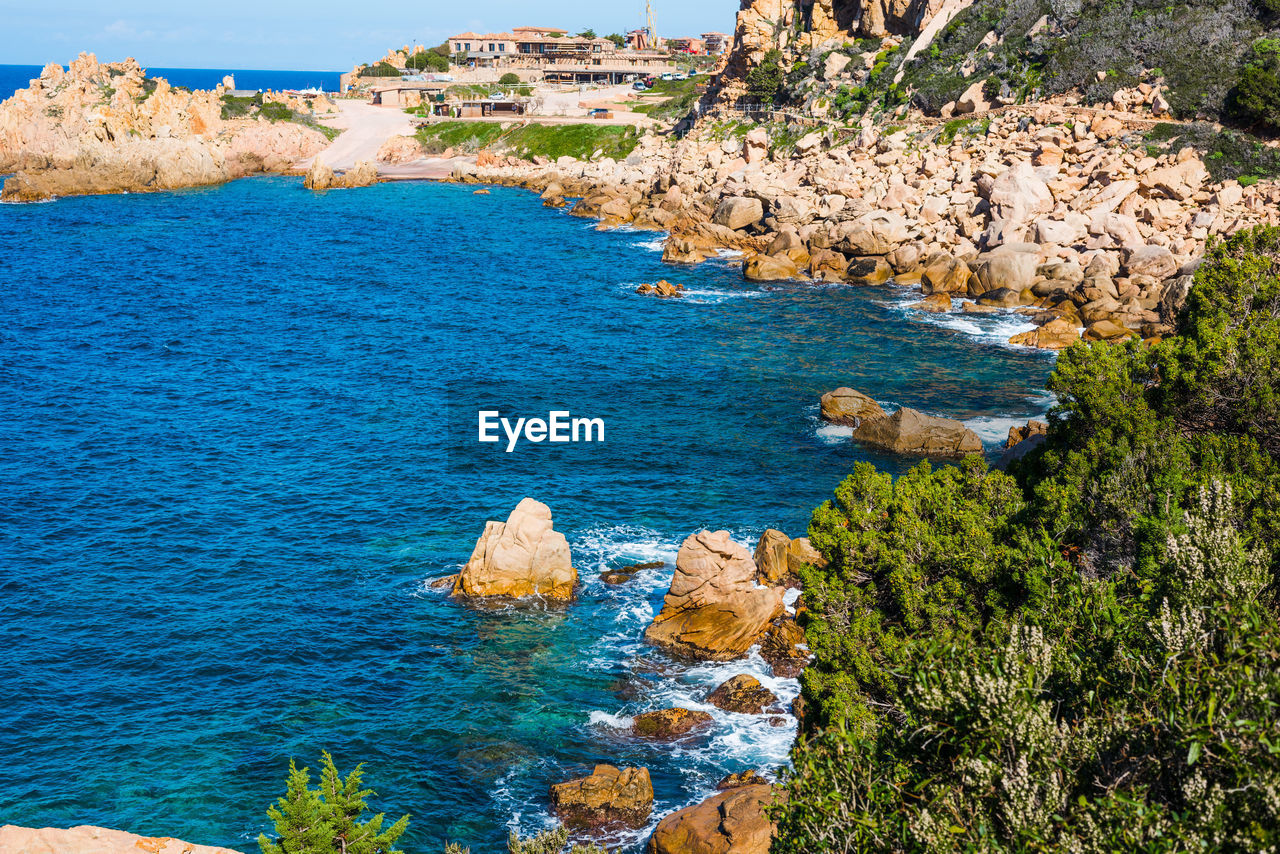 HIGH ANGLE VIEW OF SEA AND ROCK FORMATIONS