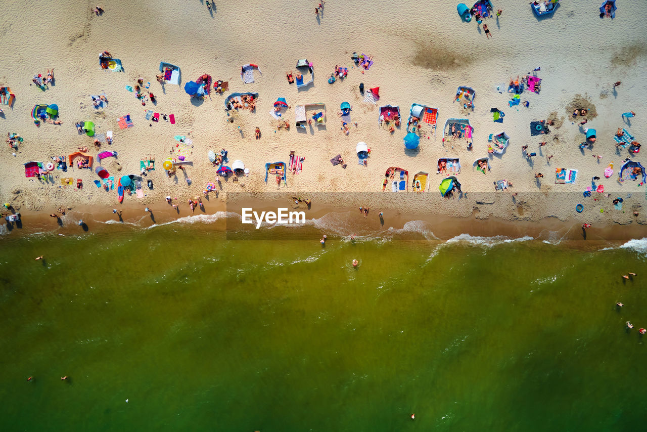 Aerial view of sea landscape with crowded sand beach in wladyslawowo. baltic sea coastline 