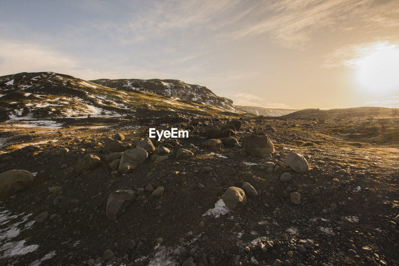 Aerial view of landscape against sky during sunset