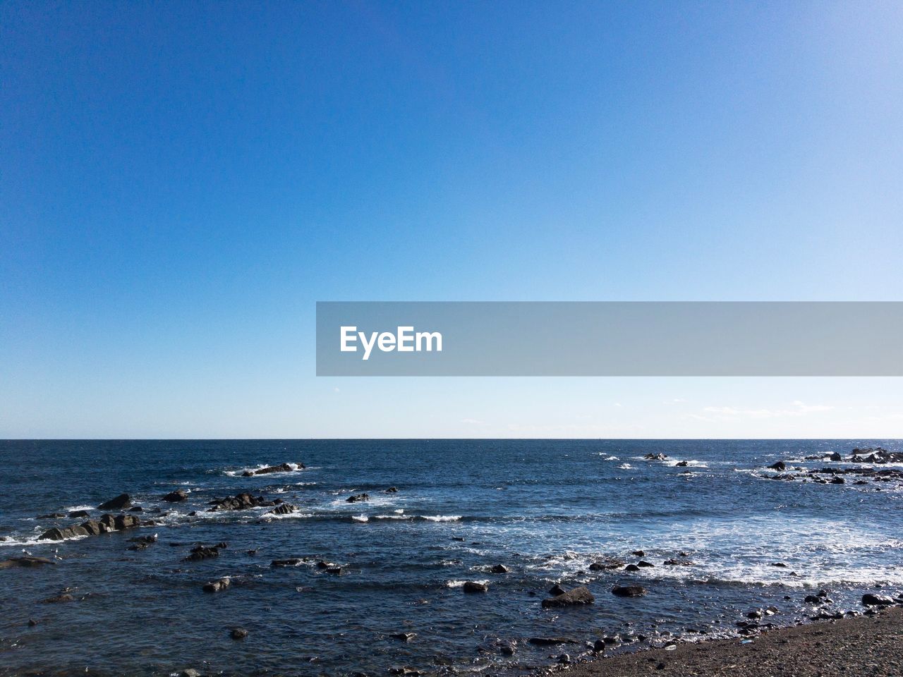 VIEW OF SEA AGAINST CLEAR BLUE SKY