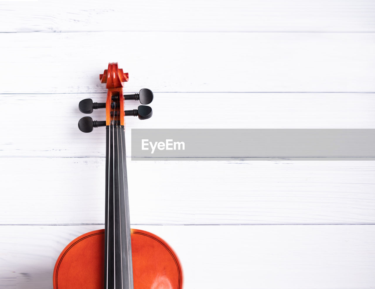 Directly above shot of violin on table