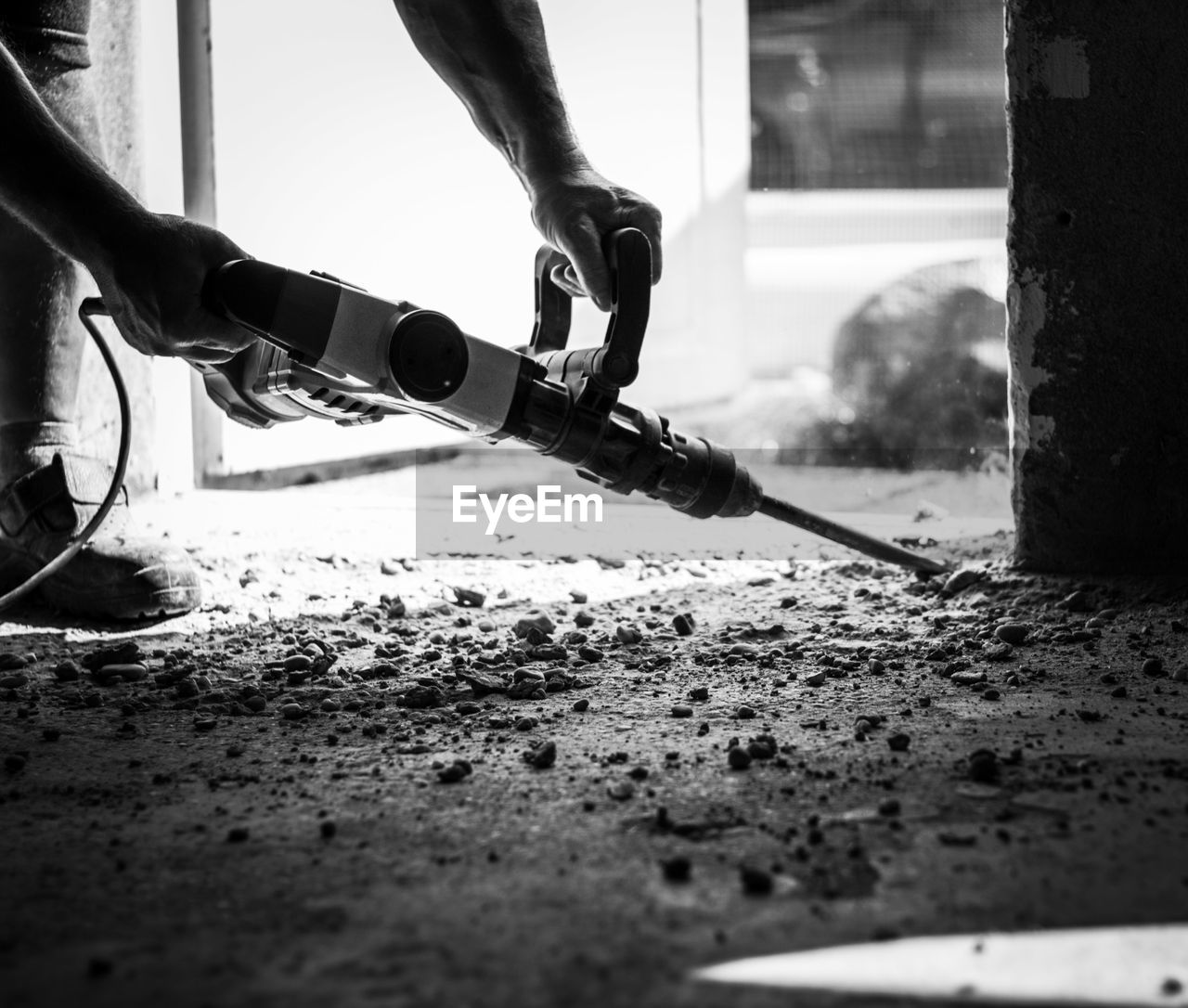 Low section of man working at construction site