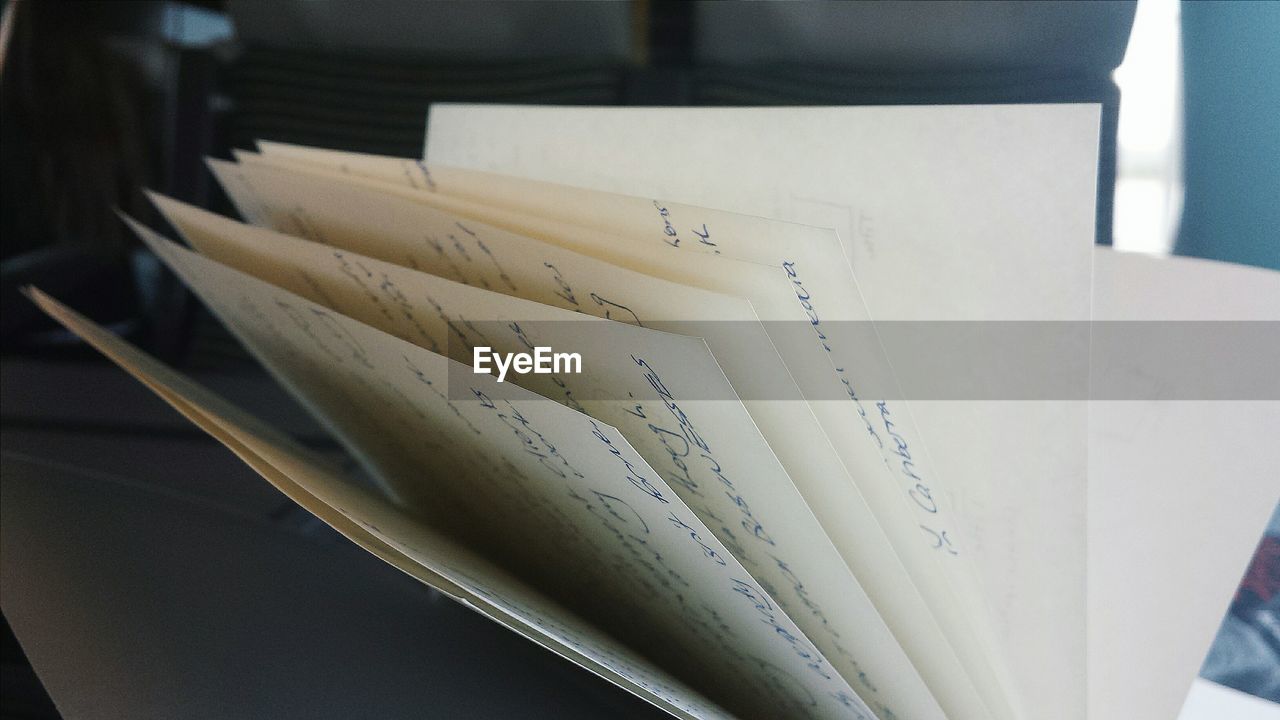 Close-up of open book pages at home