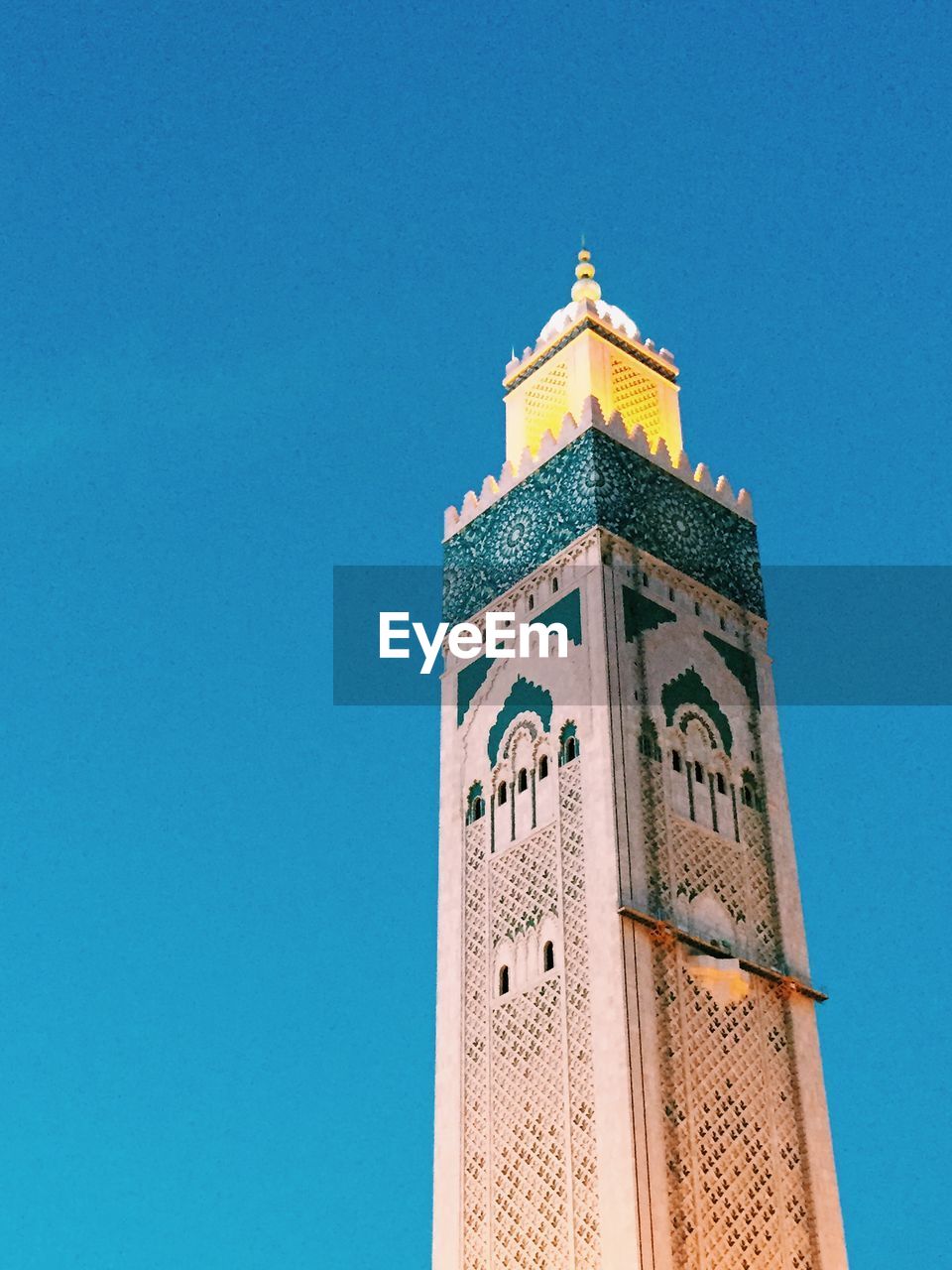 LOW ANGLE VIEW OF TOWER AGAINST CLEAR SKY