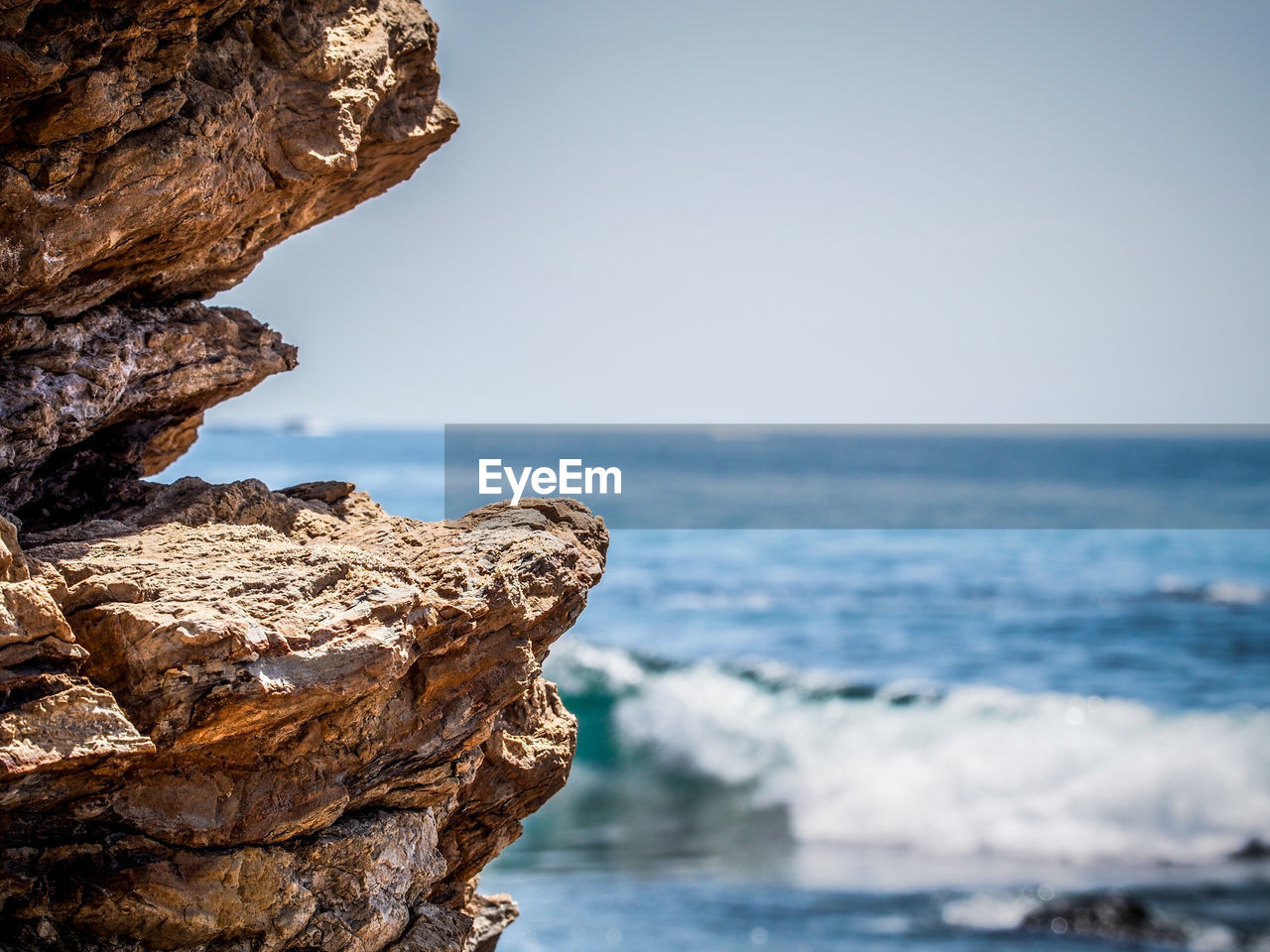 Scenic shot of rock formations in sea