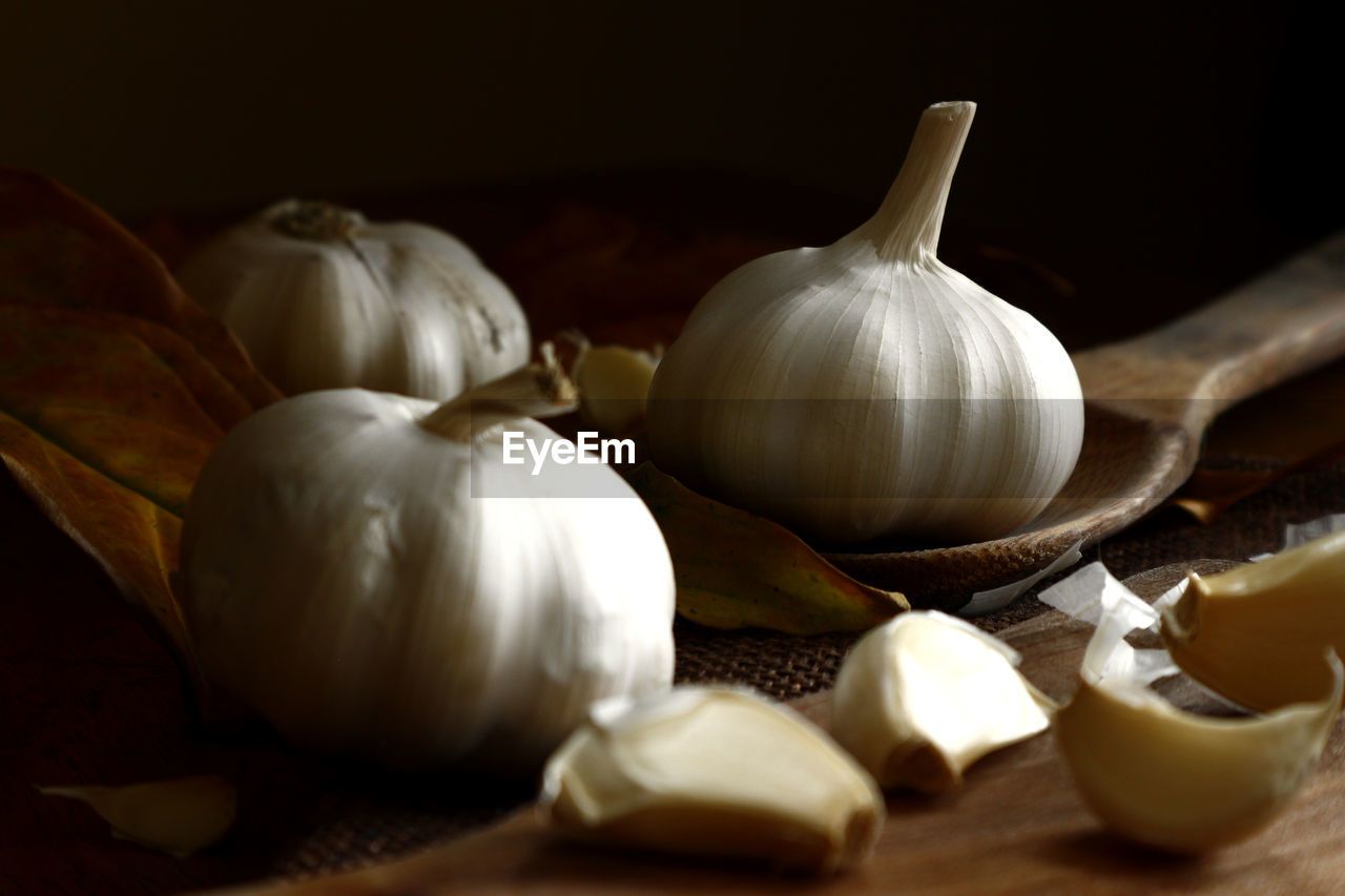 Close-up of garlic on table