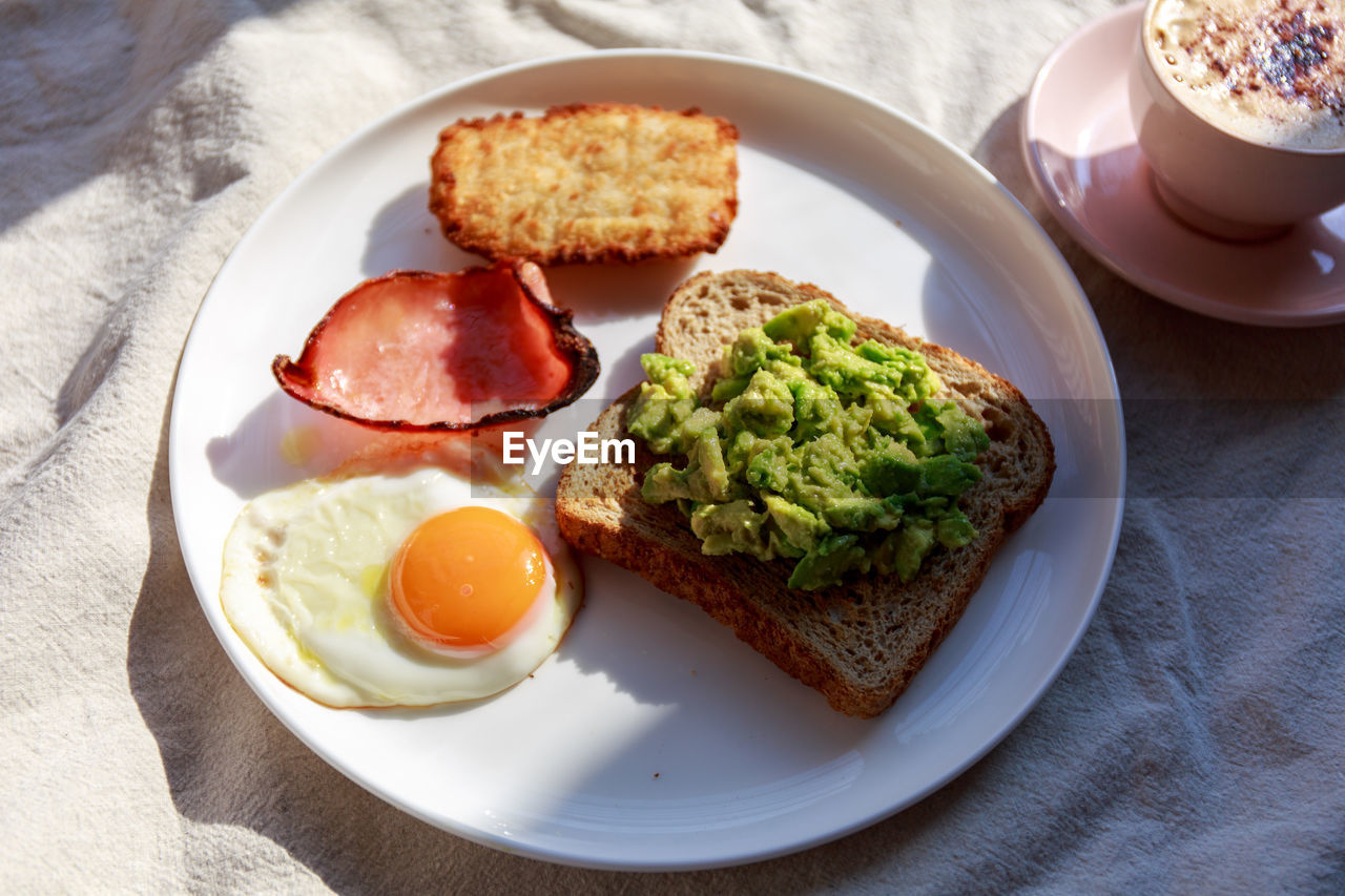 High angle view of breakfast served on table