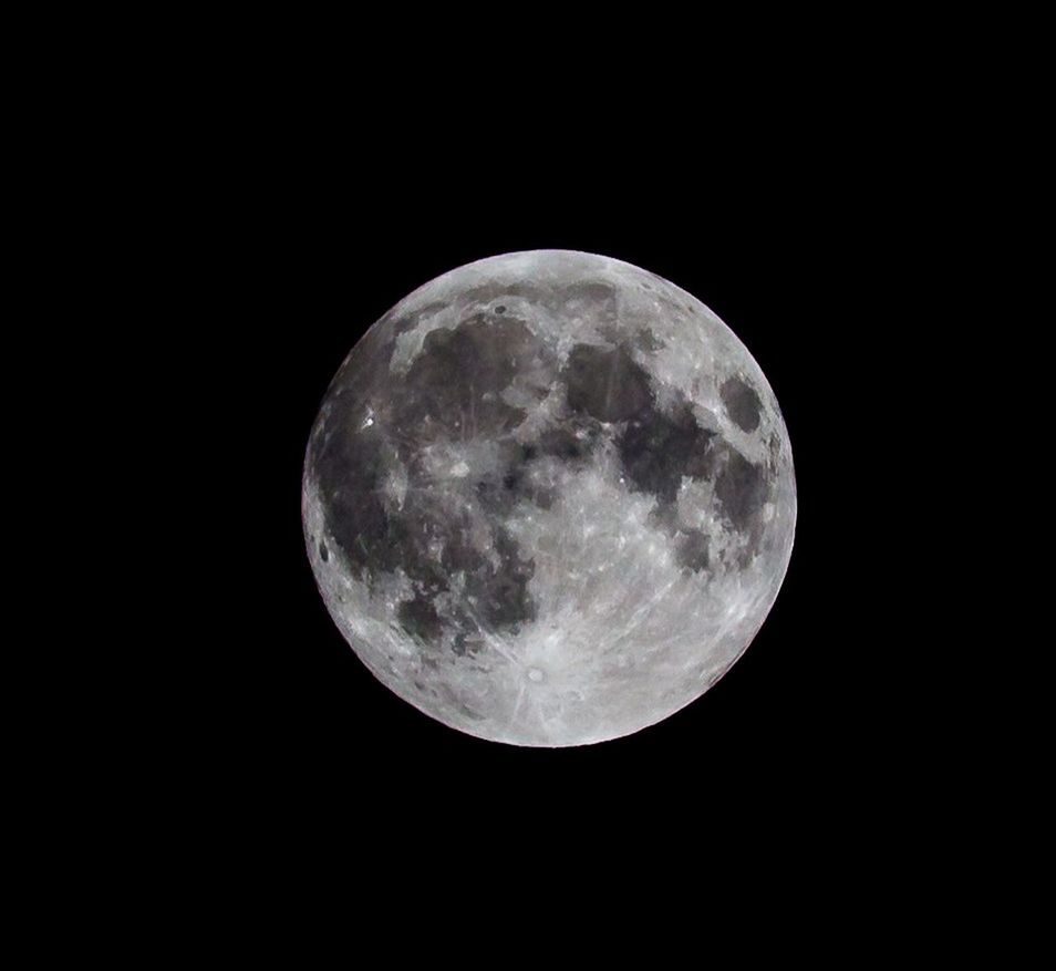 LOW ANGLE VIEW OF MOON IN SKY AT NIGHT