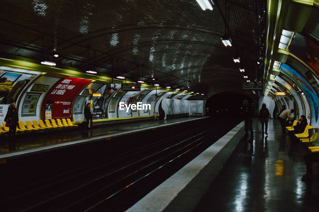 People waiting at subway station