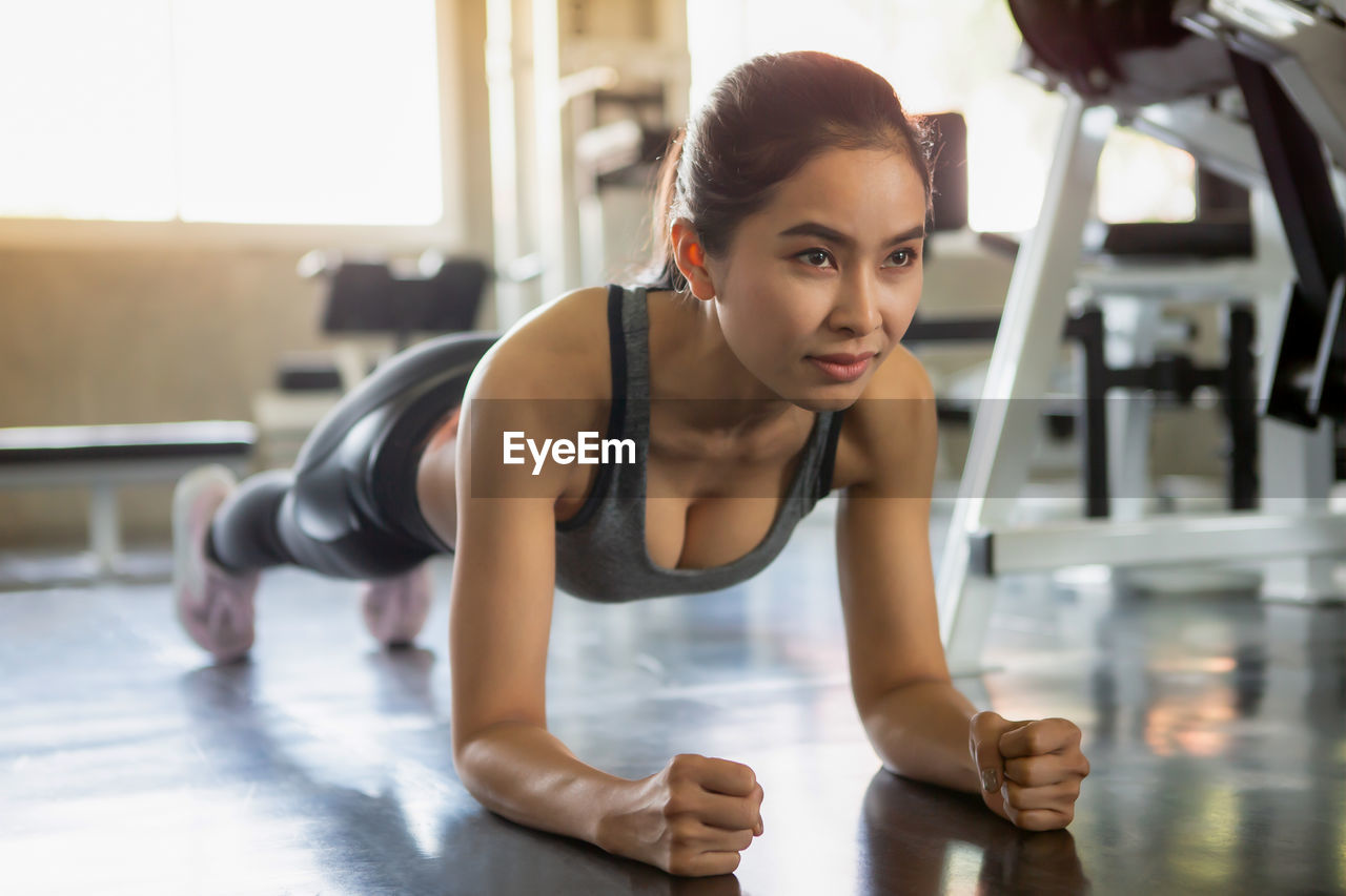 Woman exercising in gym