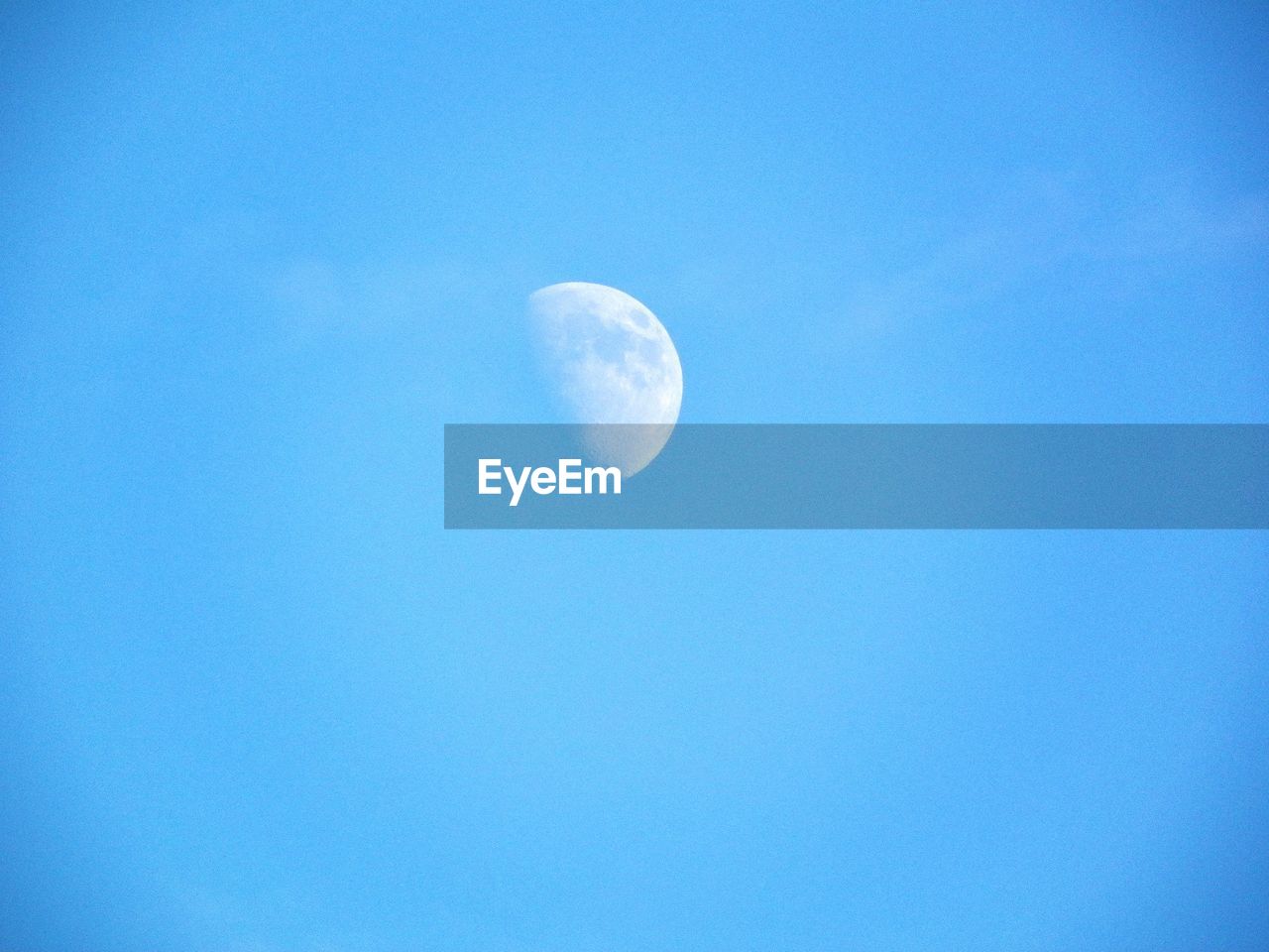 Low angle view of moon against sky