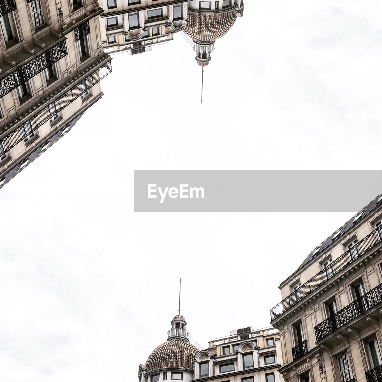 LOW ANGLE VIEW OF SKYSCRAPERS AGAINST SKY