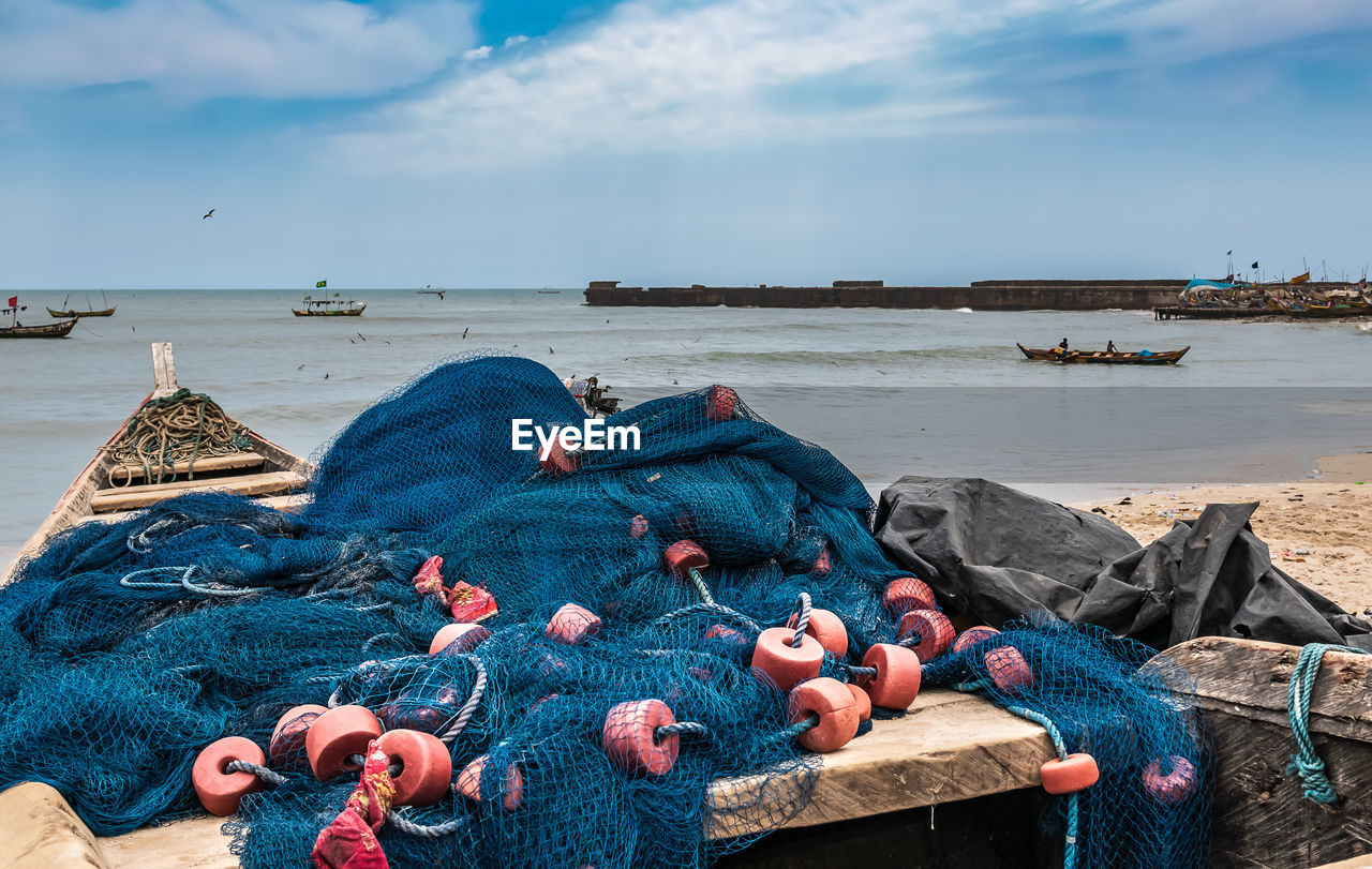 Ghana fishing boat, which is commissioned on land and is filled with fishing nets after day fishing