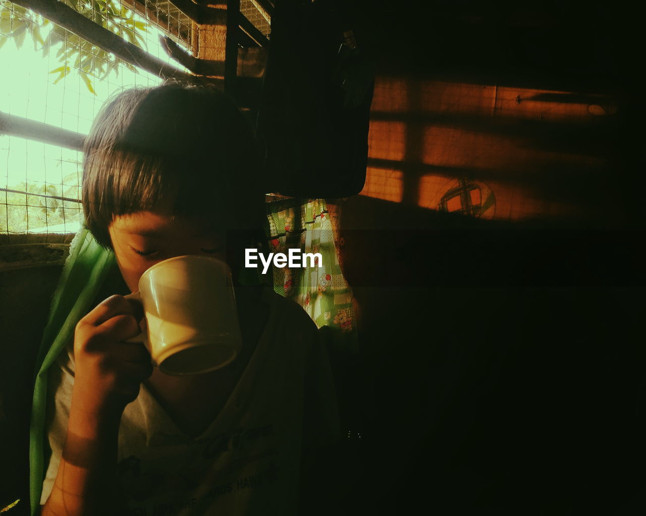 Girl drinking coffee at home