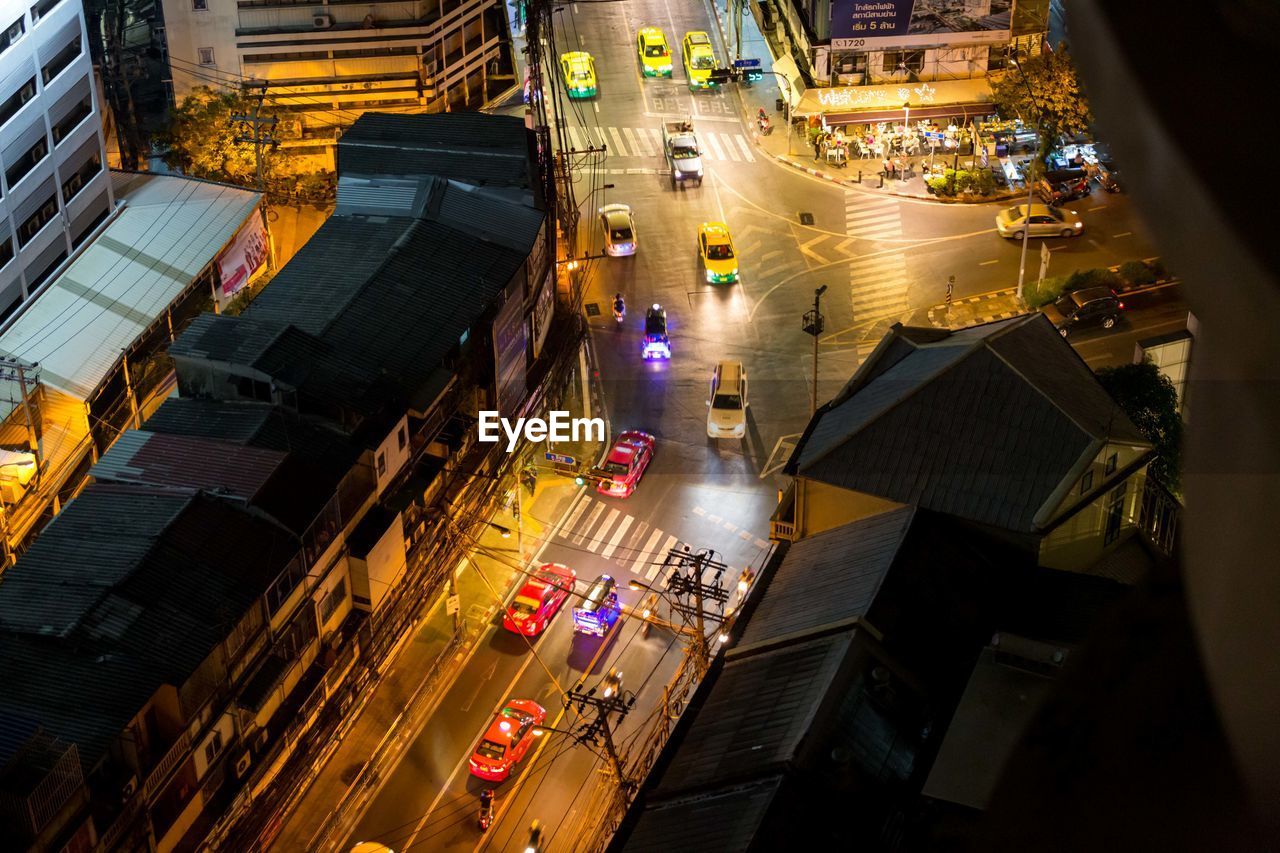 High angle view of traffic on city street at night