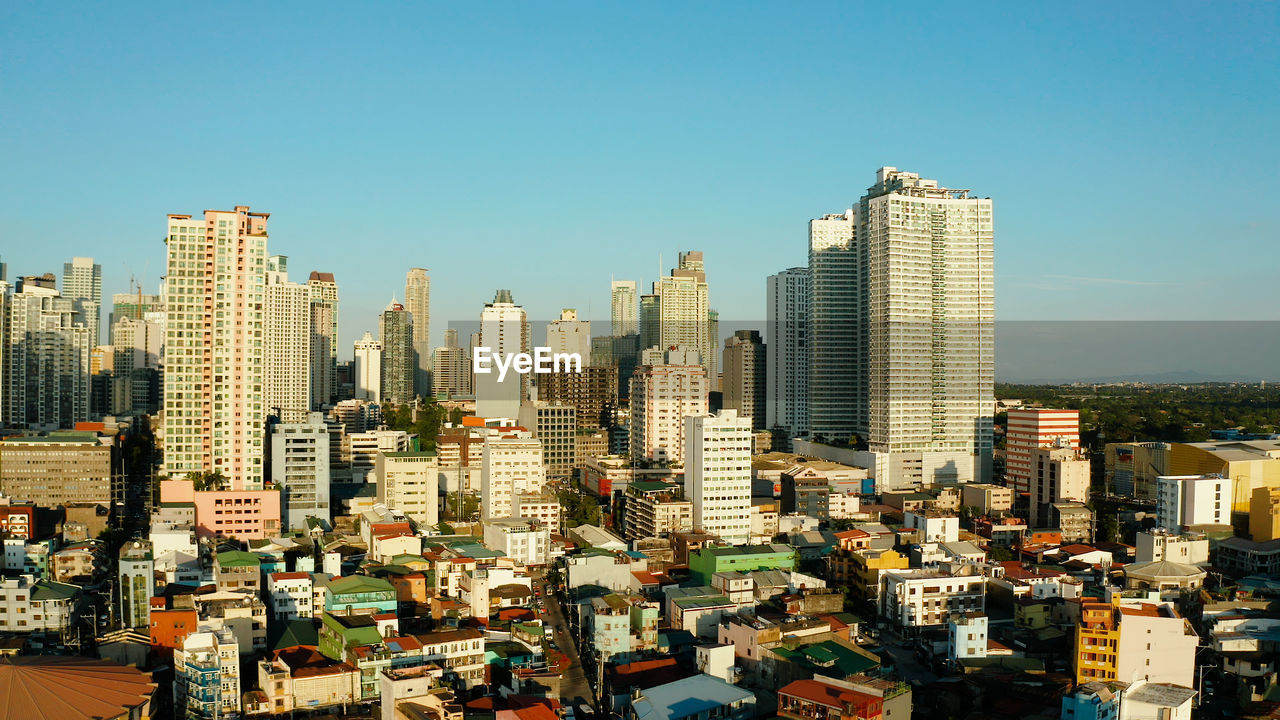 Populous city of manila, the capital of the philippines with skyscrapers, streets and buildings. 