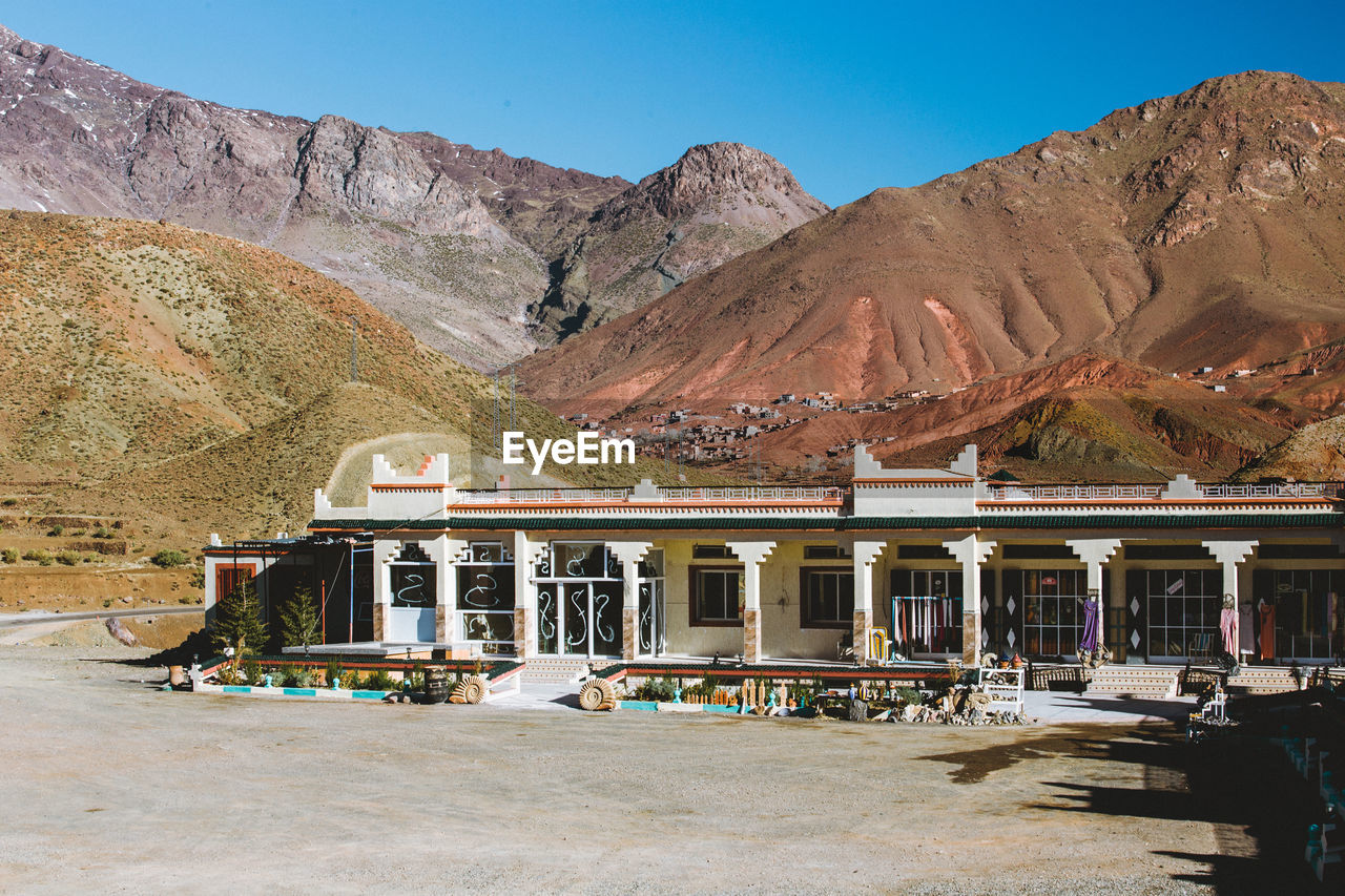 Scenic view of moroccan berber hostel in atlas mountains canyon, morocco, africa