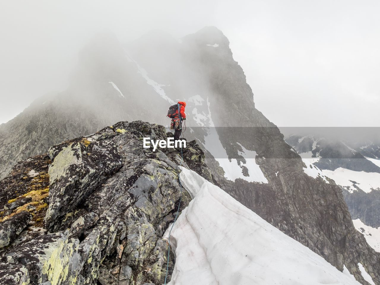 View of person standing on snow covered mountain