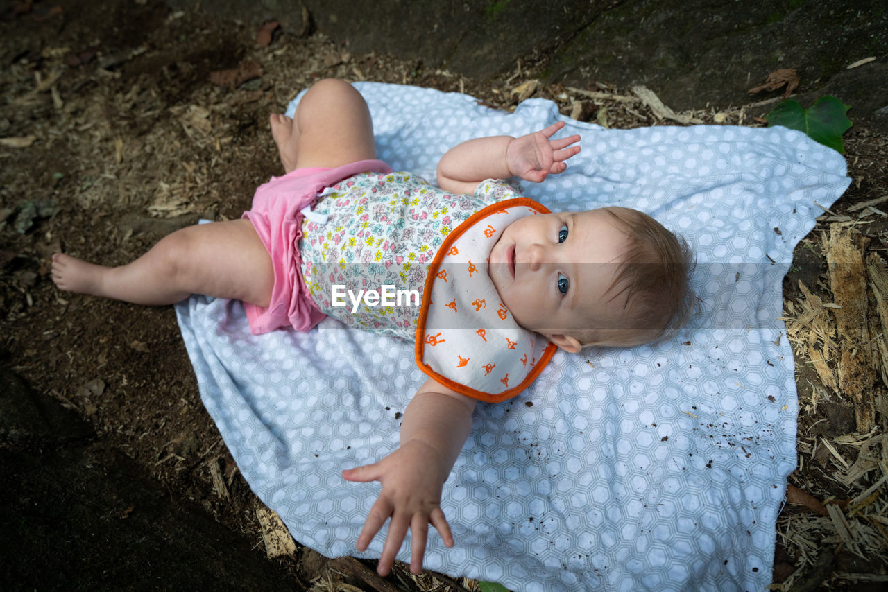 High angle view of cute baby lying down