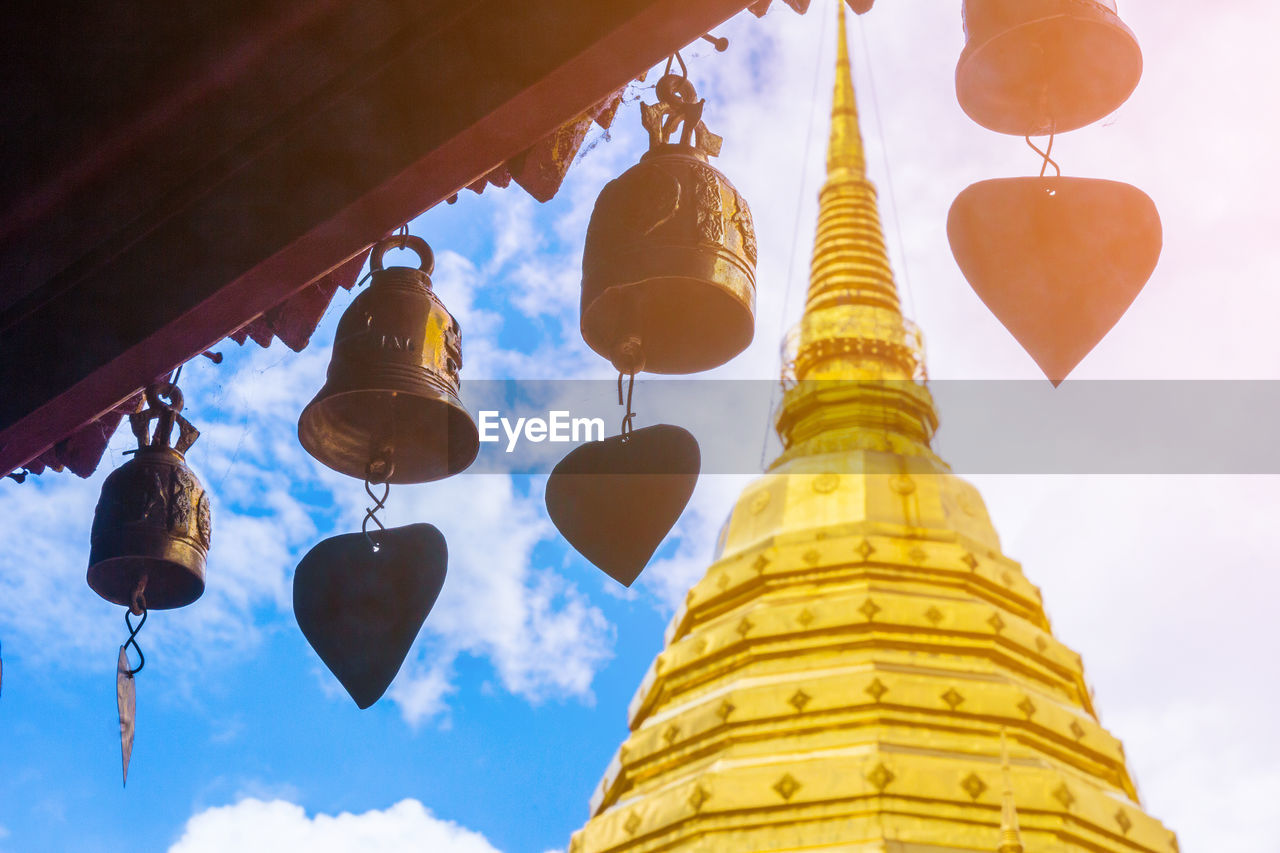 LOW ANGLE VIEW OF PAGODA HANGING AGAINST SKY