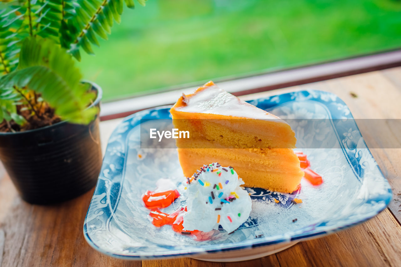 Close-up of ice cream in plate on table