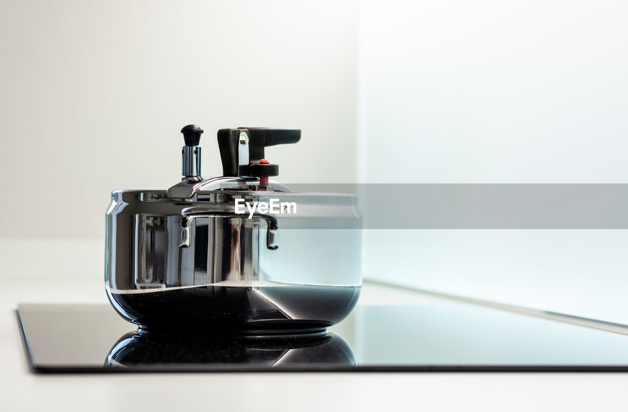 close-up of kitchen utensils against white background