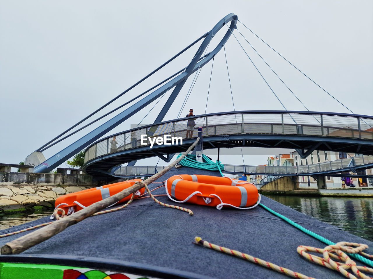 transportation, water, mode of transportation, architecture, nautical vessel, bridge, built structure, sky, vehicle, boat, nature, day, no people, boating, travel destinations, travel, city, river, outdoors, harbor, moored, building exterior, rope, watercraft