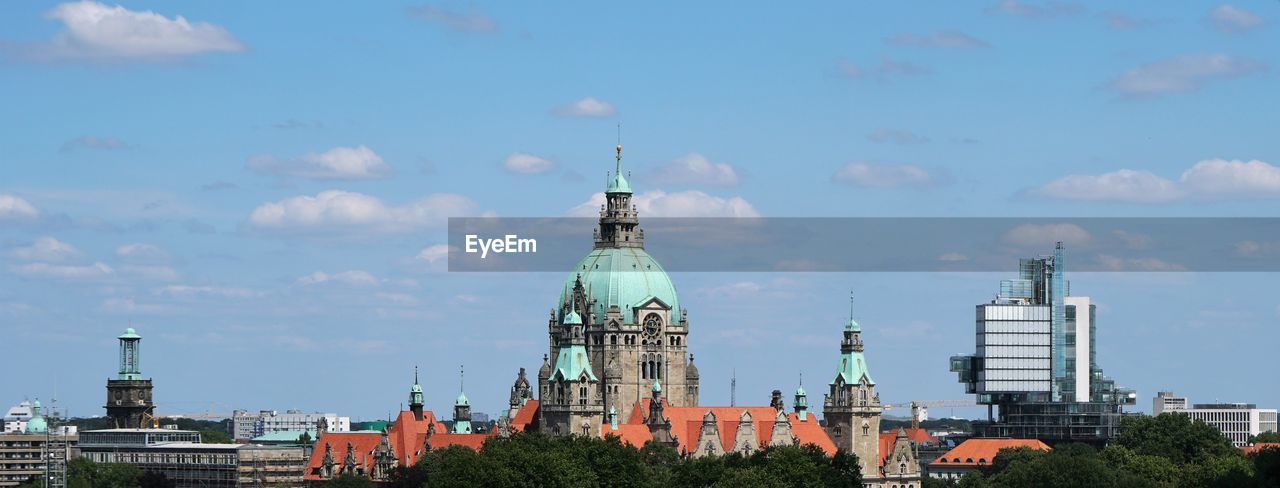 Low angle view of cathedral against blue sky during sunny day