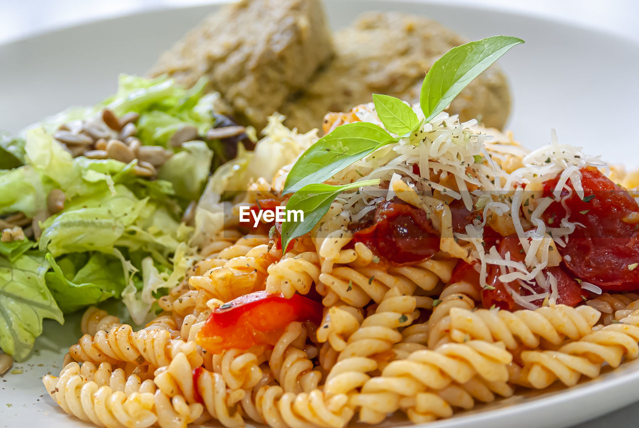 Close-up of pasta served in plate