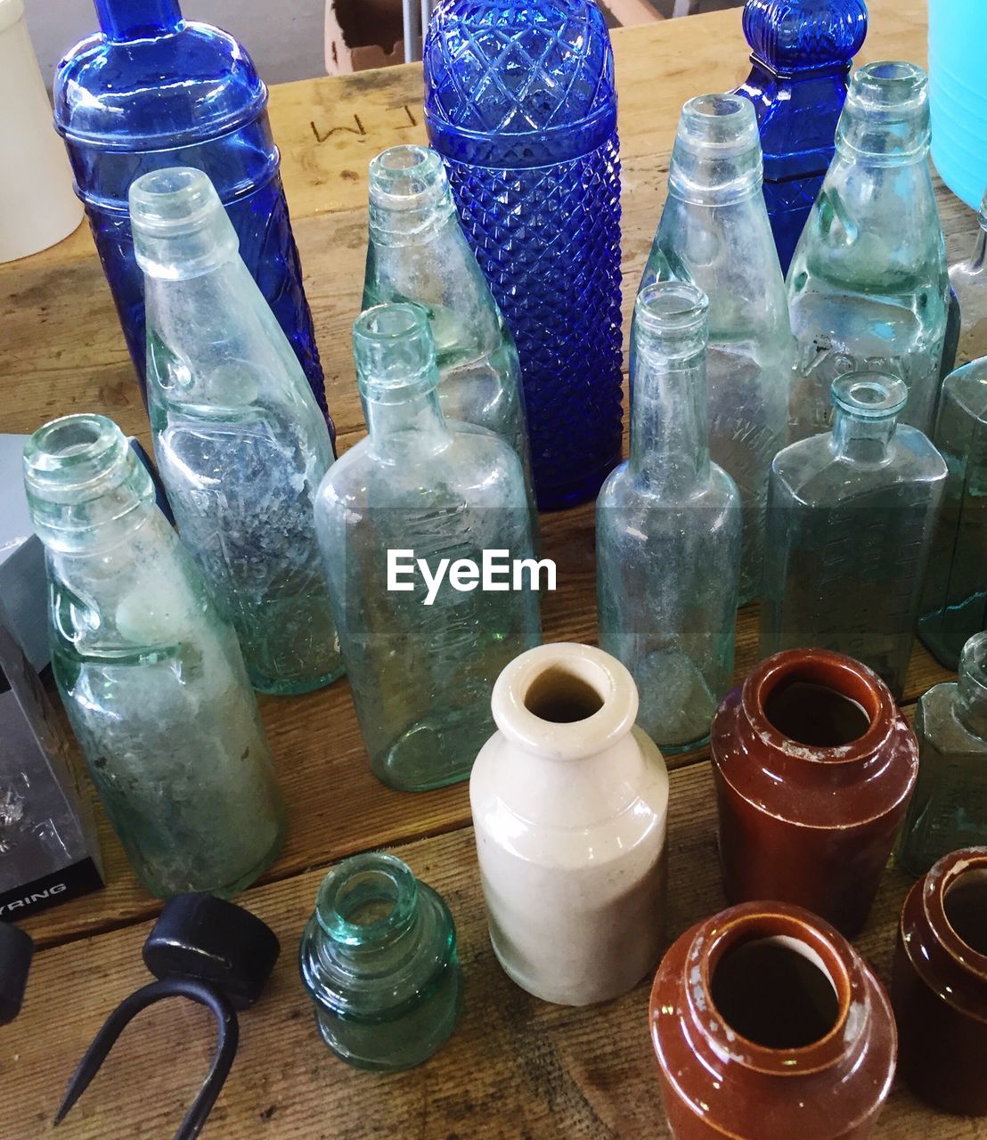 High angle view of various bottles on table