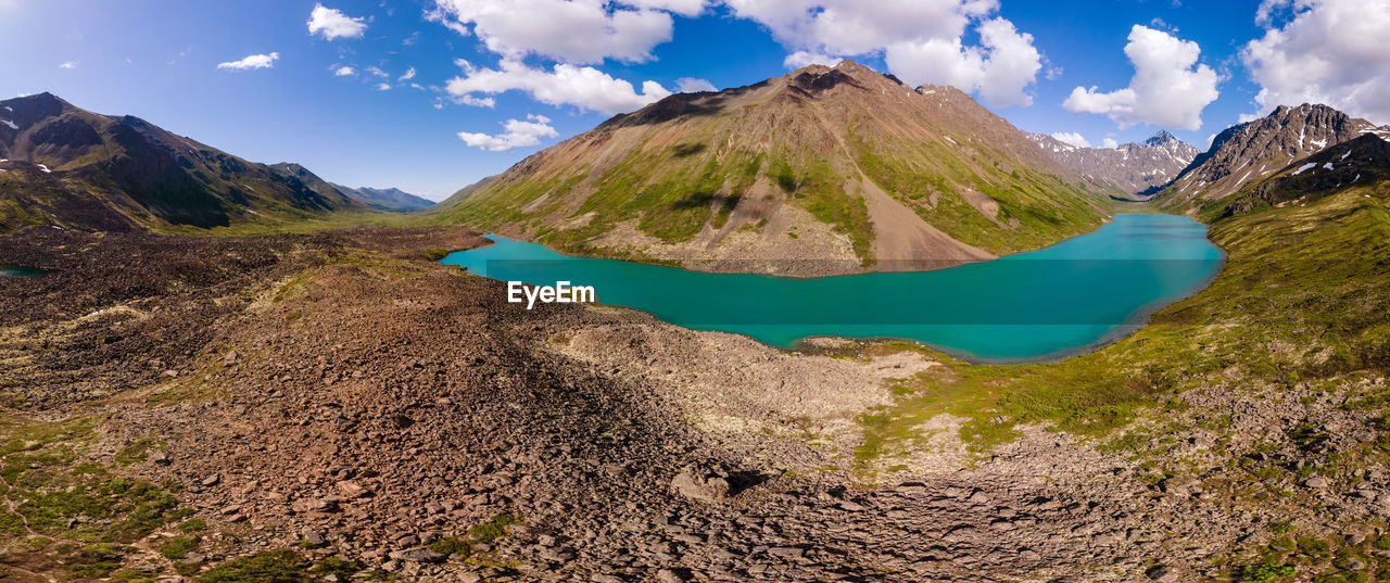 PANORAMIC VIEW OF VOLCANIC MOUNTAIN AGAINST SKY