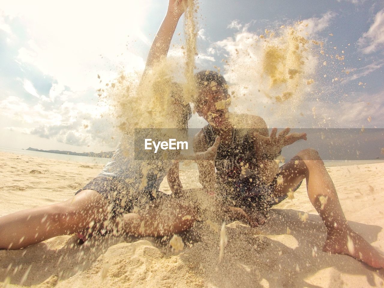 WATER SPLASHING ON BEACH