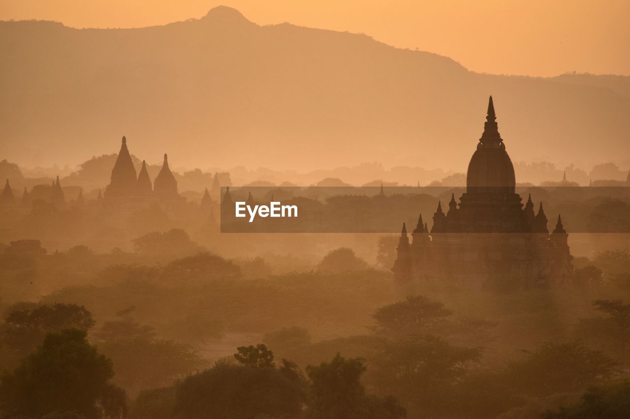 View of pagoda against sky during sunset