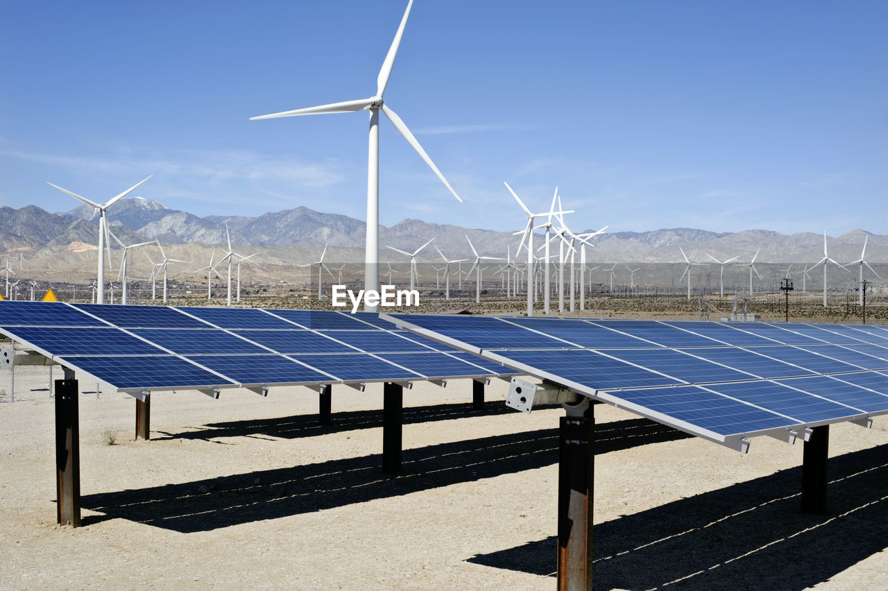 Energy making wind farm and solar panel array in palm springs, california