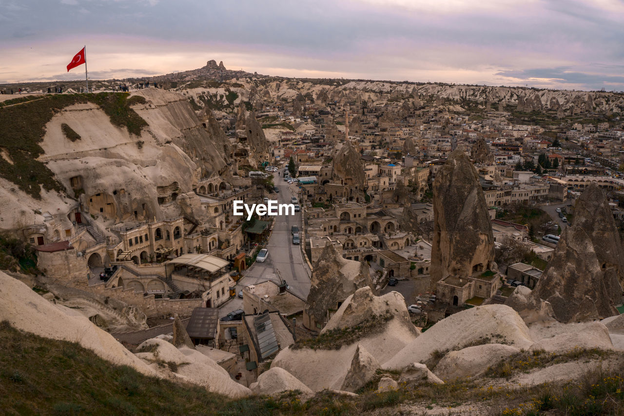 HIGH ANGLE VIEW OF MODERN BUILDINGS IN CITY