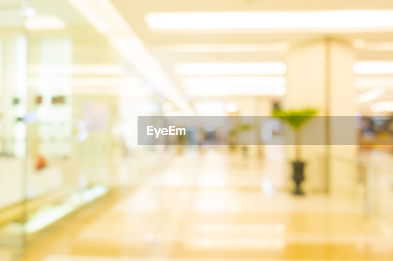 Defocused image of illuminated empty corridor