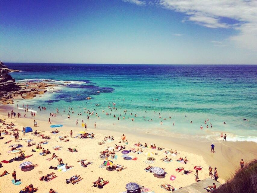 TOURISTS ENJOYING ON BEACH