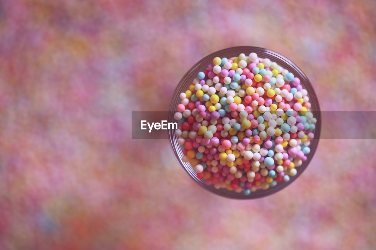 Close-up of sprinkles in bowl on table