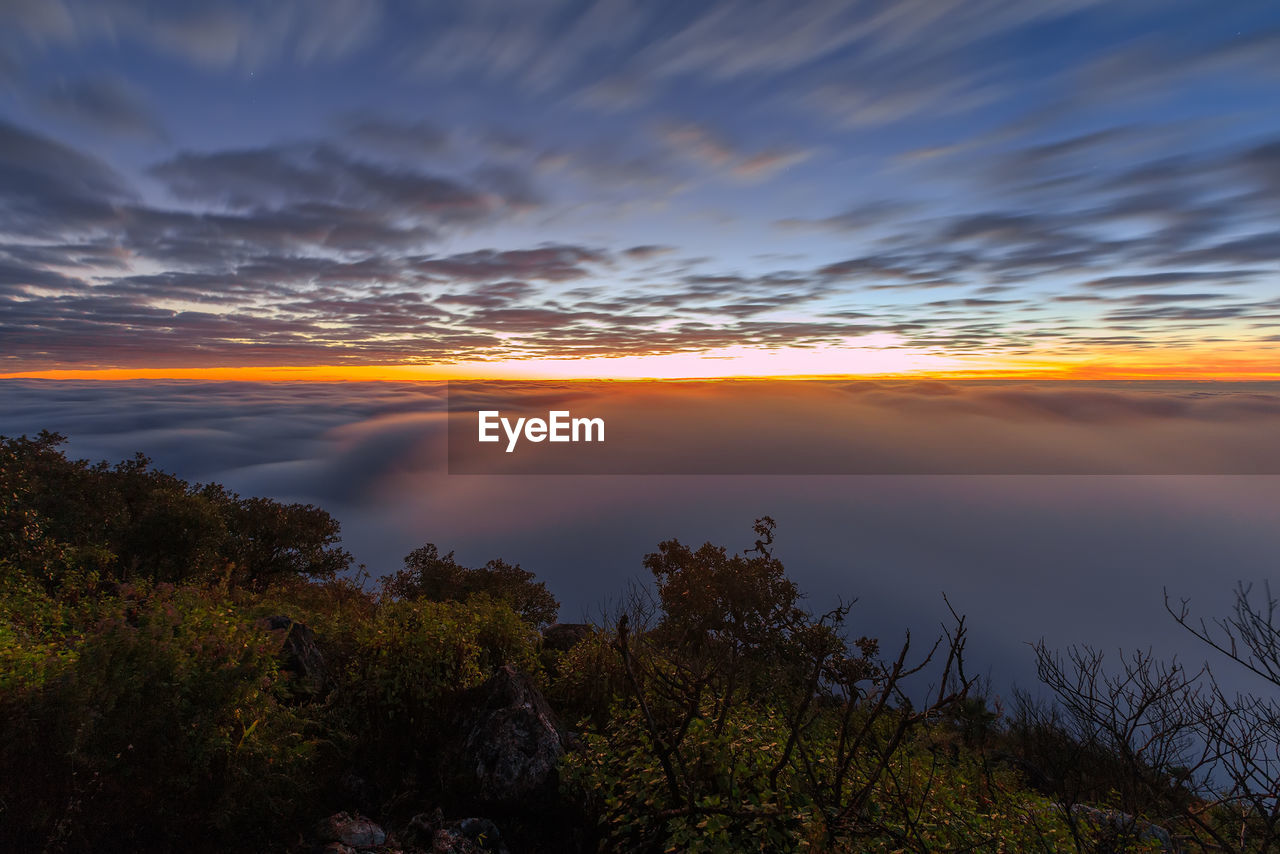 SCENIC VIEW OF DRAMATIC SKY AT SUNSET