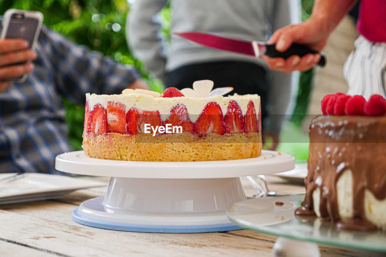 CLOSE-UP OF CAKE WITH ICE CREAM