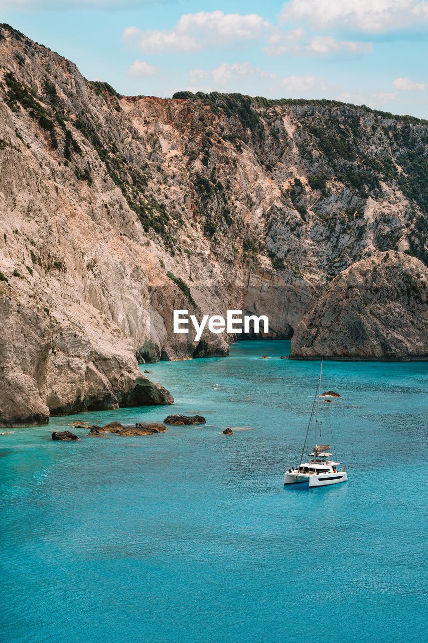 Sailboat sailing on sea in lefkada island