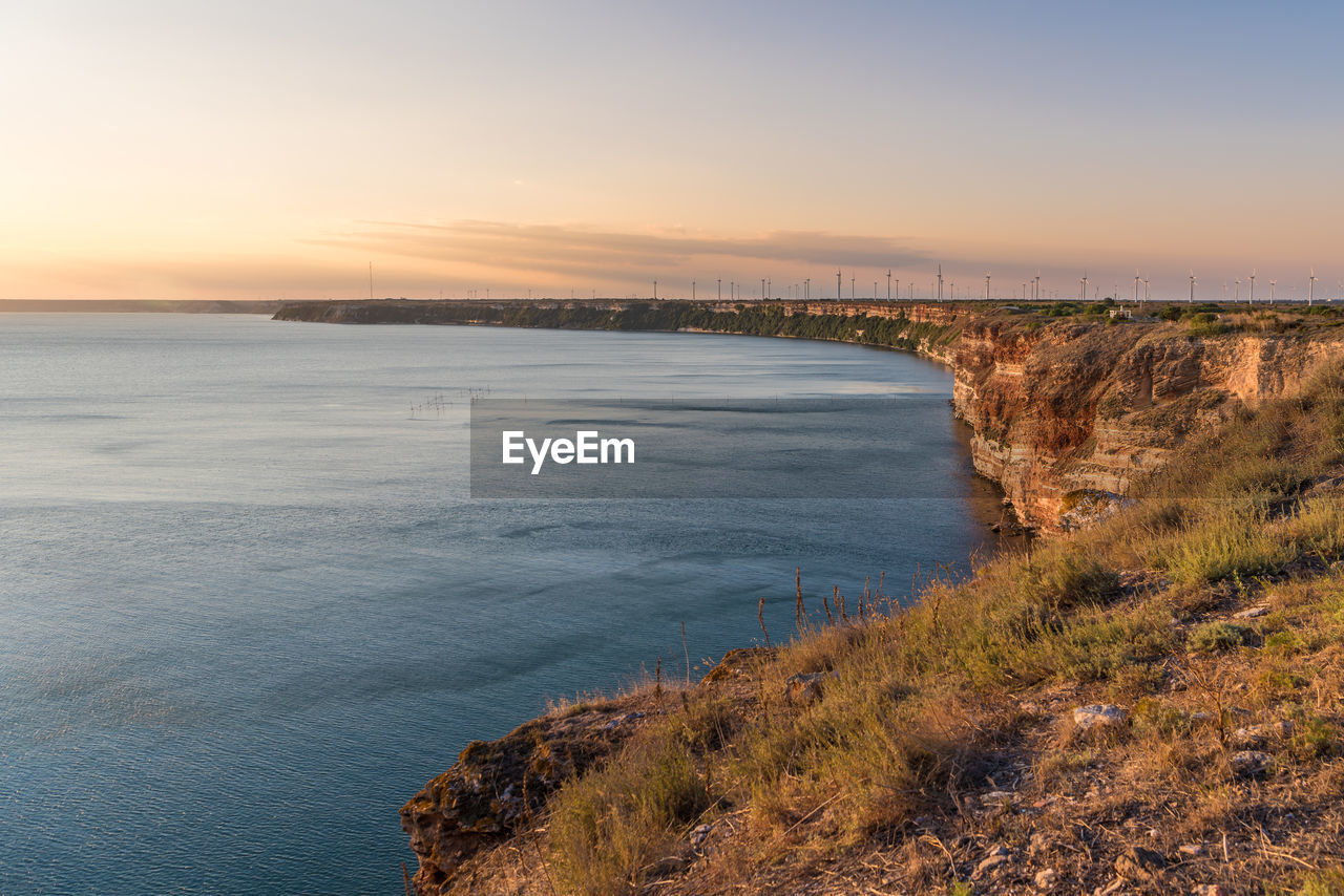 Scenic view of black sea at cape kaliakra at golden hour