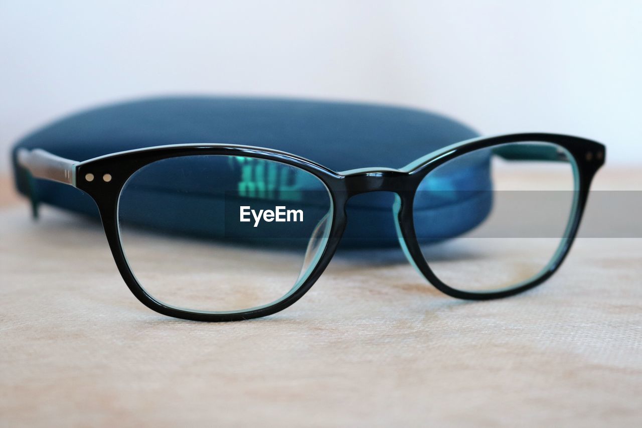 Close-up of eyeglasses on table