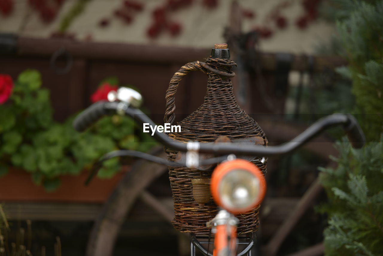 Close-up of wicker basket on bicycle