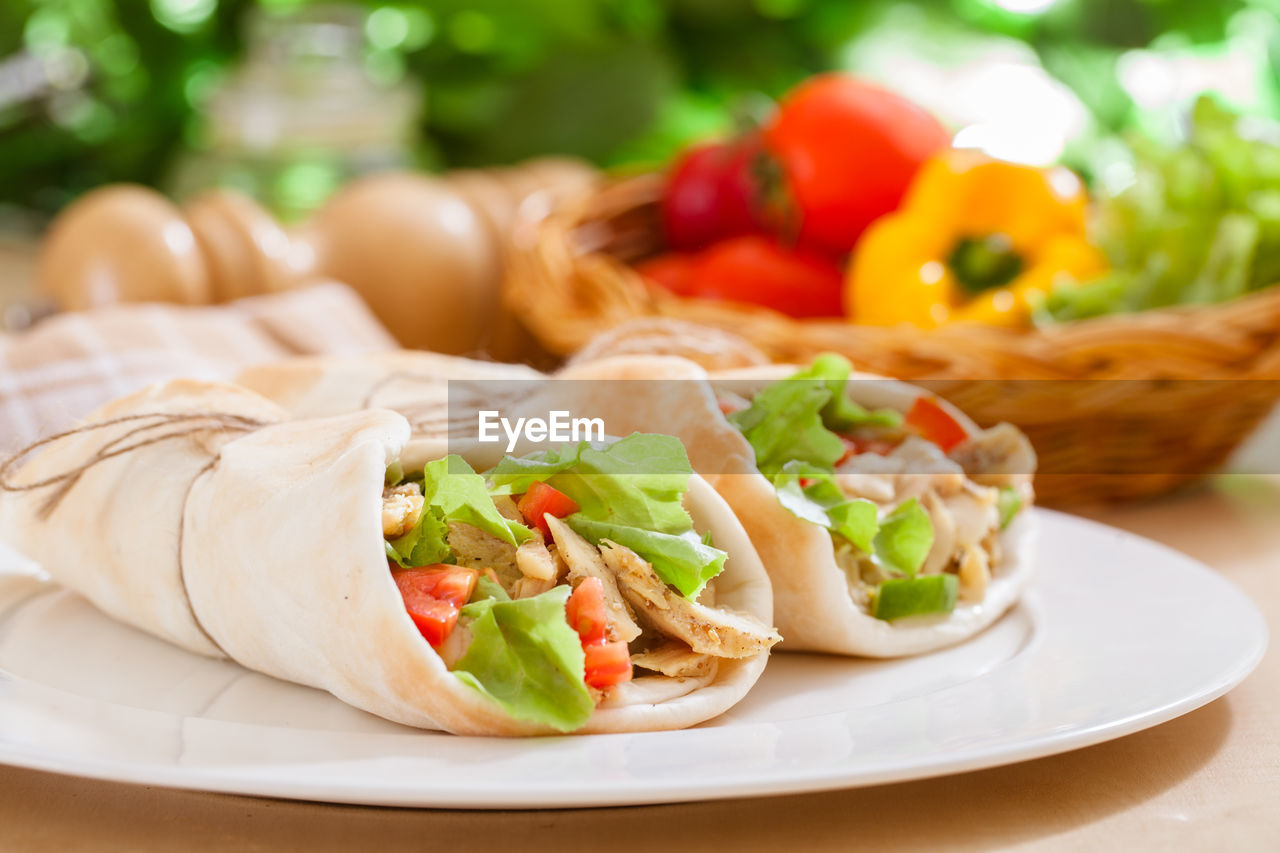 CLOSE-UP OF FOOD SERVED ON TABLE