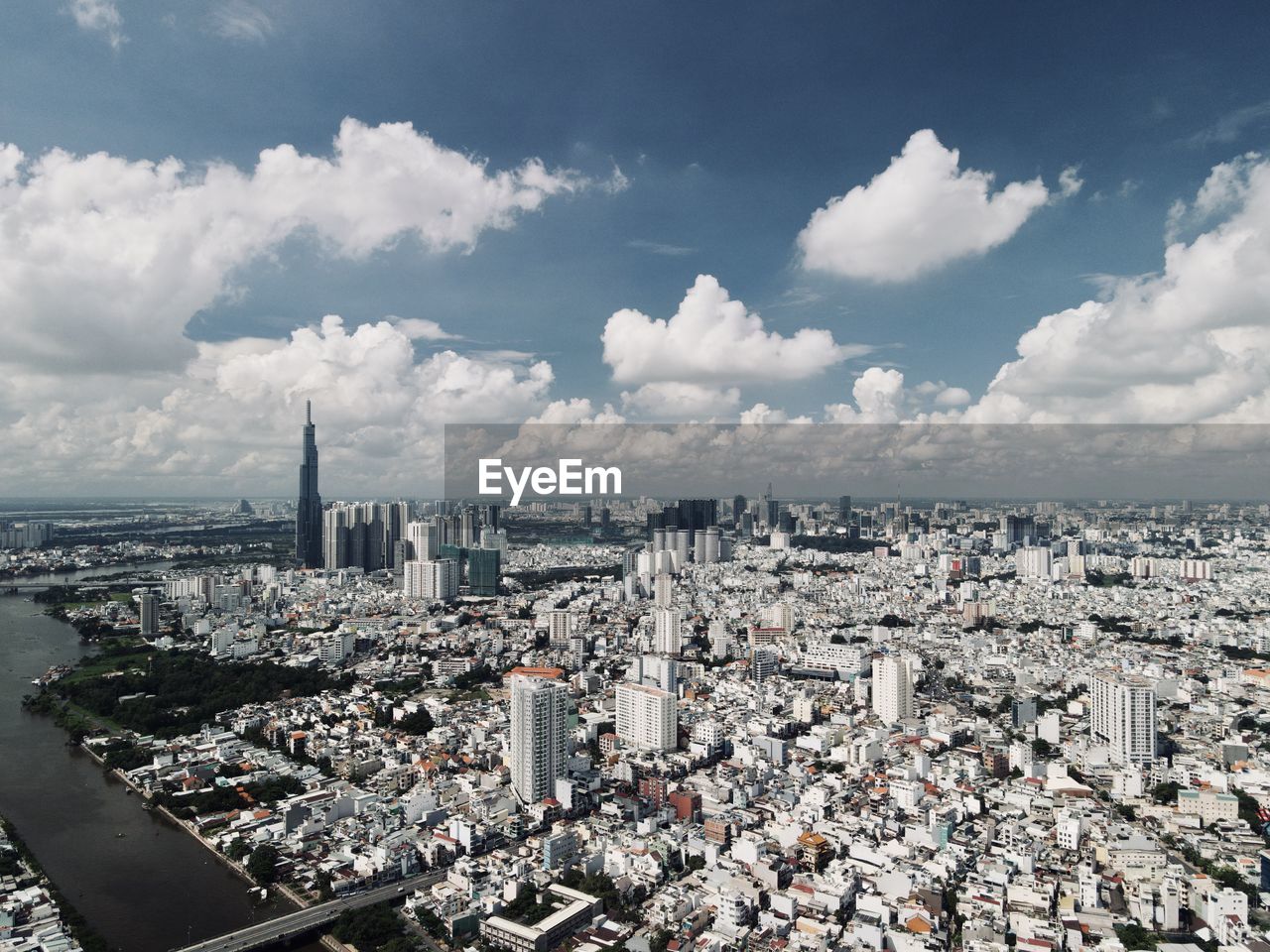 High angle view of city buildings against sky