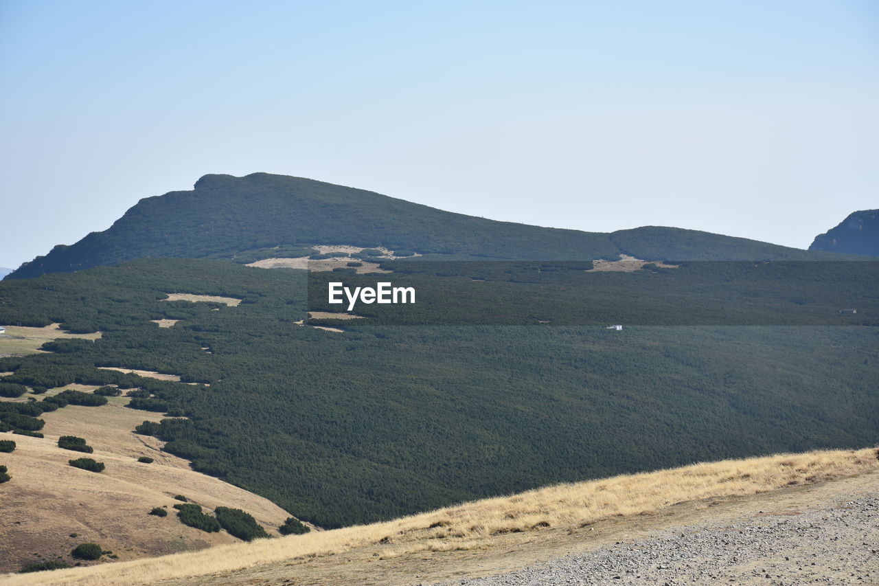 Scenic view of mountains against clear sky