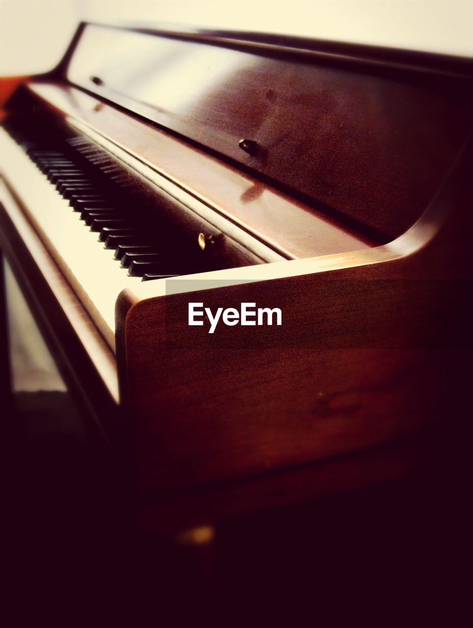 Close-up of piano at home