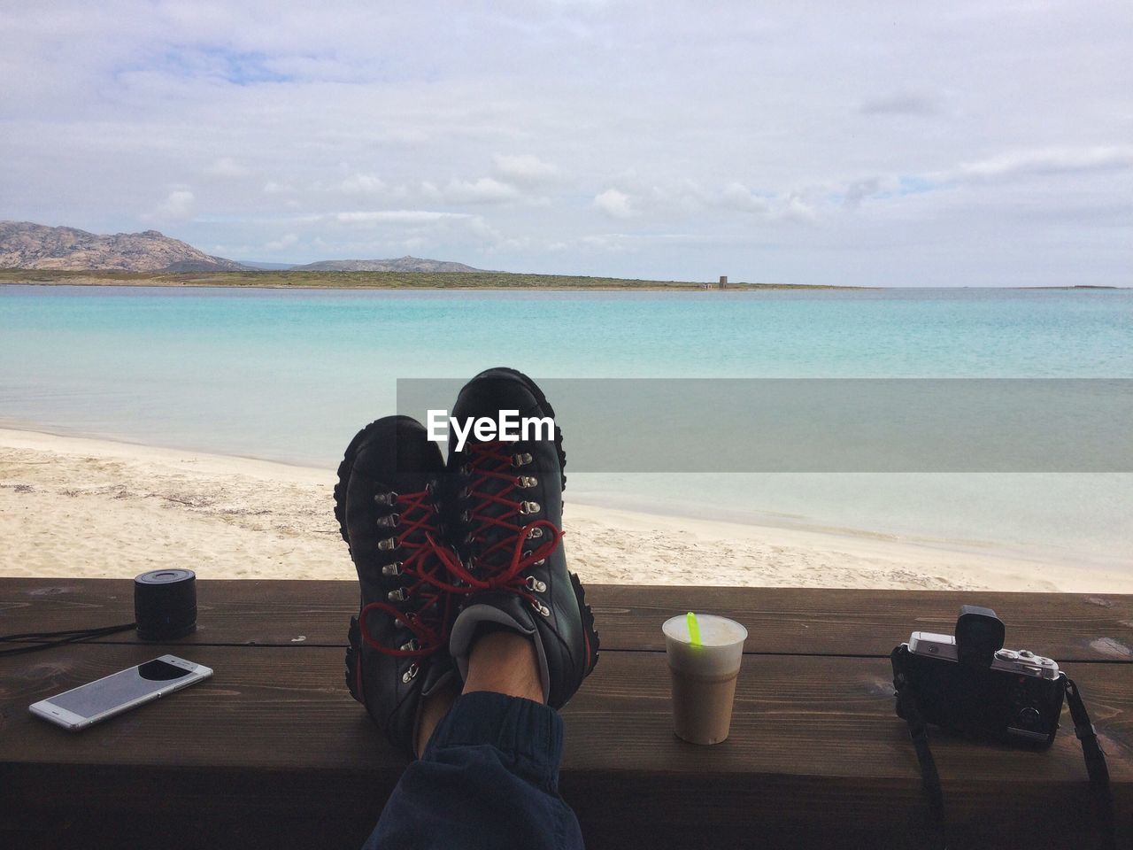 Guy relaxing at beach